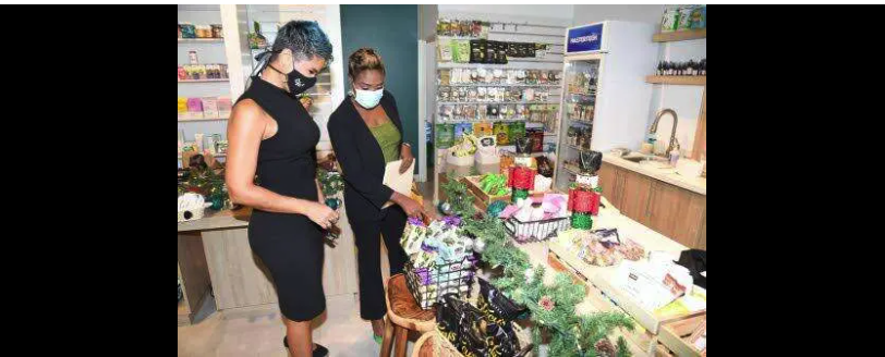 Minister of state in Ministry of Health and Wellness Juliet Cutbert-Flynn points out a few of the organicproducts to Natallie Murray, CEO, The Life Store wellness Boutique at the opening of the store at 144Constant Spring Road in St Andrew last year October. Tourism Minister Edmund Bartlett says Jamaicacould well be classified as the Caribbean's Garden of Eden with its wide selection of herbs and spices,fruits and vegetables, rivers and springs and enchanted sites of verdant countrysides and meanderinglands