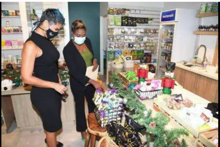 Minister of state in Ministry of Health and Wellness Juliet Cutbert-Flynn points out a few of the organicproducts to Natallie Murray, CEO, The Life Store wellness Boutique at the opening of the store at 144Constant Spring Road in St Andrew last year October. Tourism Minister Edmund Bartlett says Jamaicacould well be classified as the Caribbean's Garden of Eden with its wide selection of herbs and spices,fruits and vegetables, rivers and springs and enchanted sites of verdant countrysides and meanderinglands