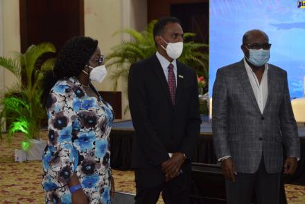 Minister of Tourism, Hon. Edmund Bartlett (right), shares a moment with Director of the Tourism Linkages Network, Carolyn McDonald-Riley (left), and Executive Director of the Tourism Enhancement Fund, Dr. Carey Wallace, at the opening of the Jamaica Health and Wellness Conference on November 18, at the Montego Bay Convention Centre, St. James.
